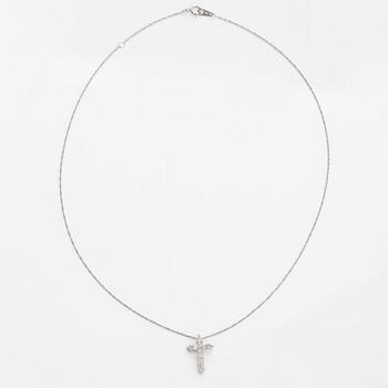 A platinum necklace with a cross pendant set with brilliant-cut diamonds 0.52 ct acording to engraving.