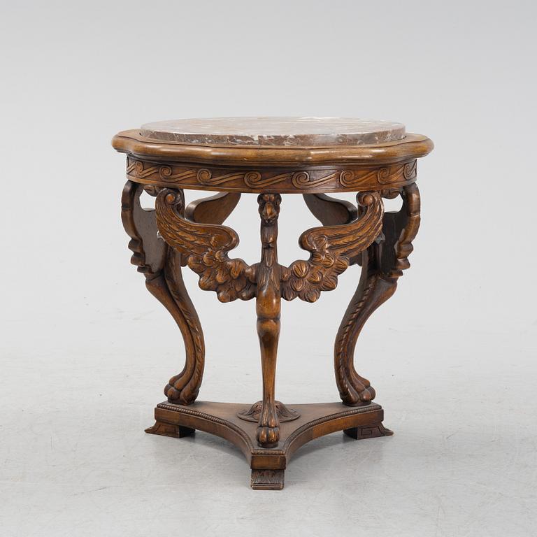 An oak sidetable with stone top, early 20th Century.