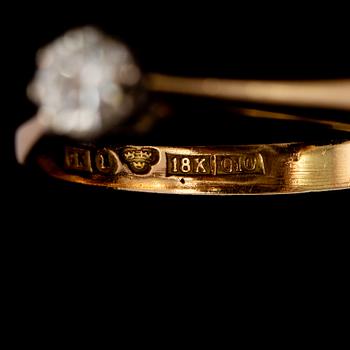 RING, 18k guld och vitguld med briljantslipad diamant, 0.24 ct,  Kaplans, Stockholm, 1990. Vikt 2 g.