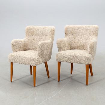 Armchairs, a pair from the mid-20th century.