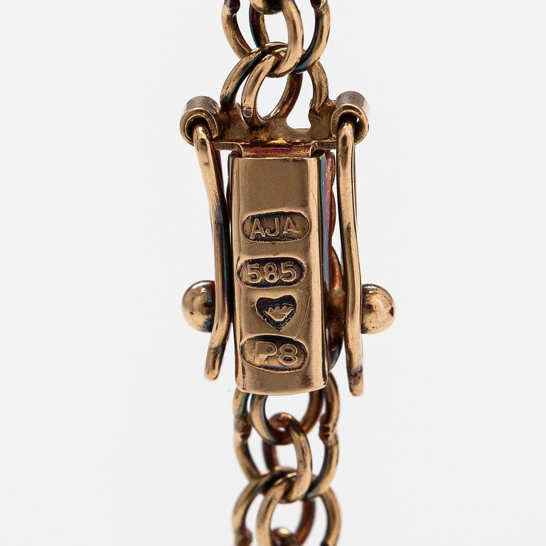 A 14K gold necklace. Aittamäki Ky, Nurmisjärvi 1992.