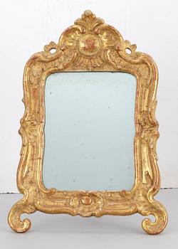 A Rococo toilette mirror.