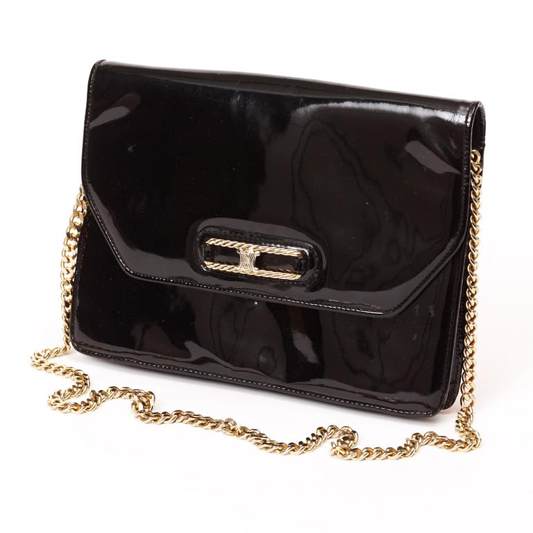 A black shoulder bag by Celine.