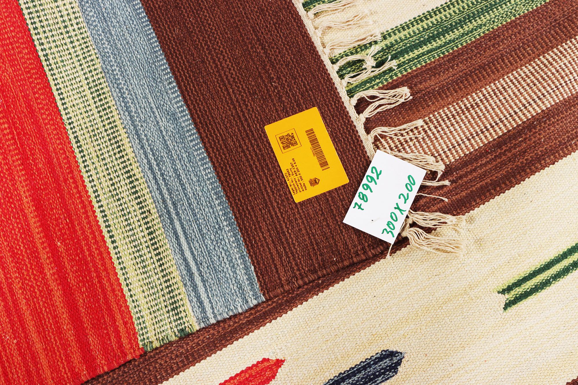 A Durry carpet, c. 200 x 200 cm.
