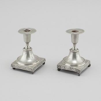 A pair of pewter candlesticks, probably by Gustaf Frederic Wigholm in Eskilstuna, first half of the 19th century.