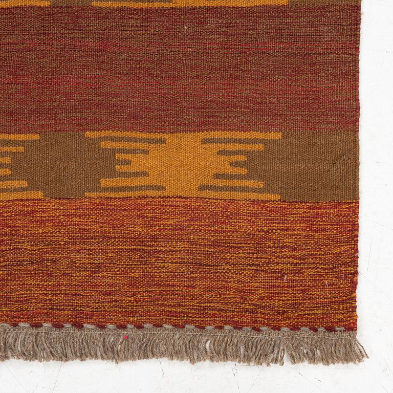 A persian kilim rug, c 196 x 154 cm.