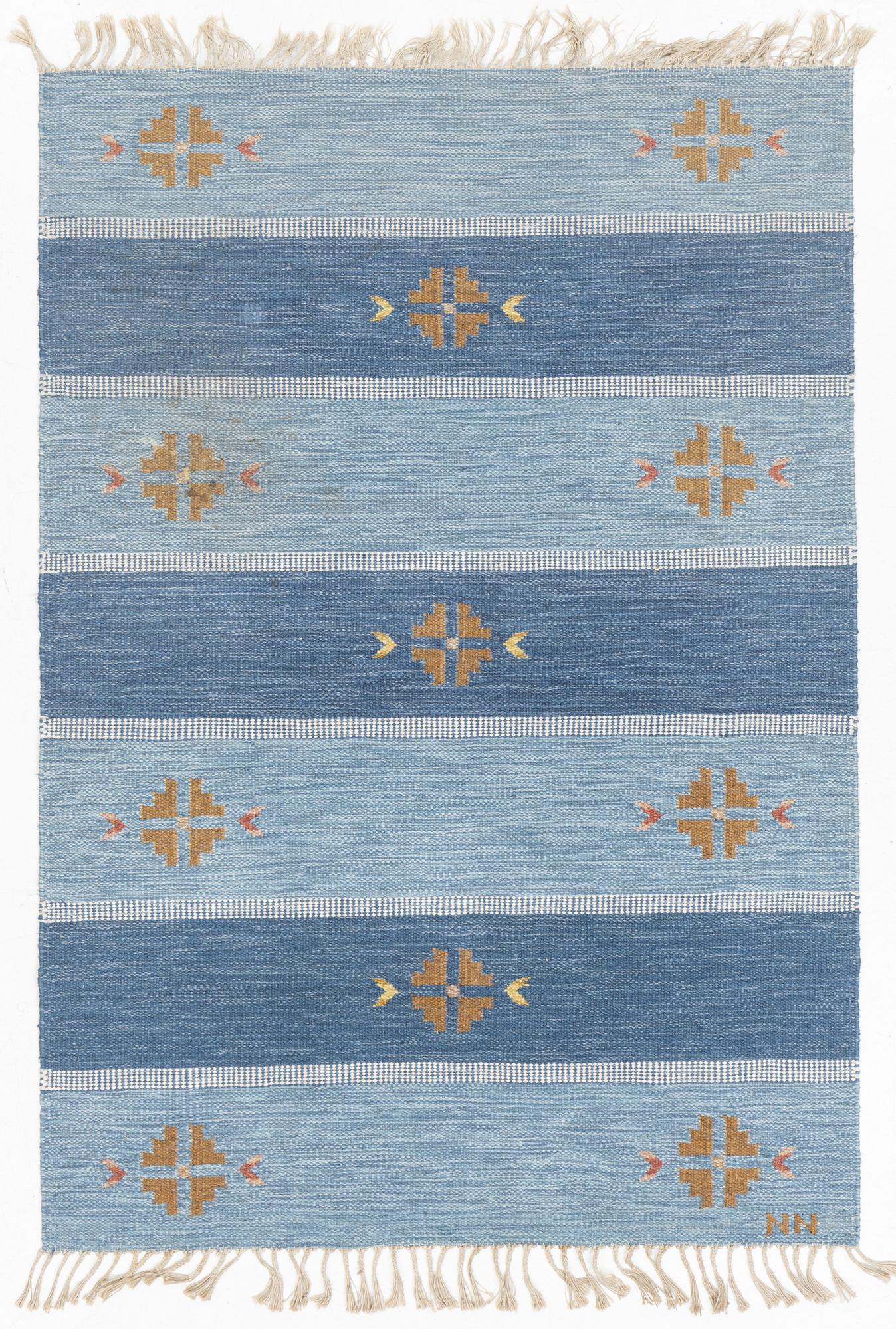 A flat weave carpet, Sweden, signed NN, ca 205 x 142 cm.