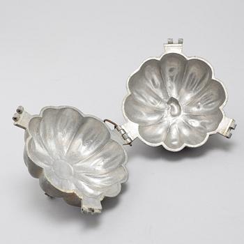 Nine ice cream and marzipan molds, first half of the 20th century.