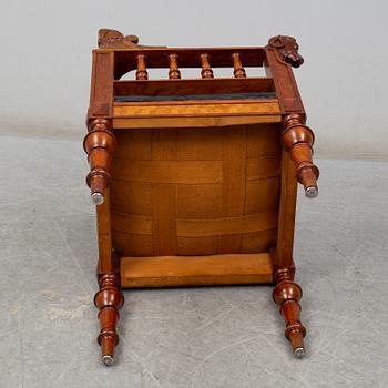 A late 19th century writing desk and armchair.