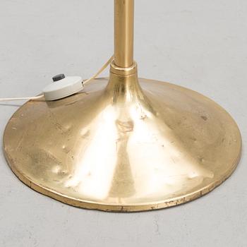 A 1970's floor lamp by Kai Ruokonen for Orno, Finland.