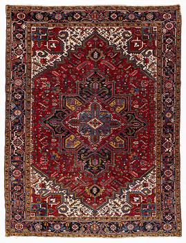 A carpet, Heriz, ca 315 x 243 cm.
