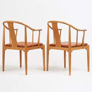 Hans J. Wegner, a pair of the " China Chair" in cherry wood, Fritz Hansen, Denmark 1969.
