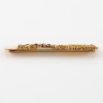 Arnaldo Pomodoro, a brooch, 18K gold with rubies, Italy 1962.
