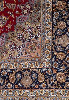 A carpet, Old Esfahan, part silk, ca 298,5 x 203 cm.