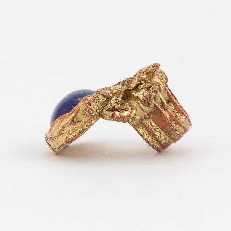 A ring by YVES SAINT LAURENT,