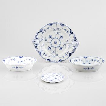 Four porcelain pieces of half lace "Musselmalet", Royal Copenhagen, Denmark, 1894-1945.