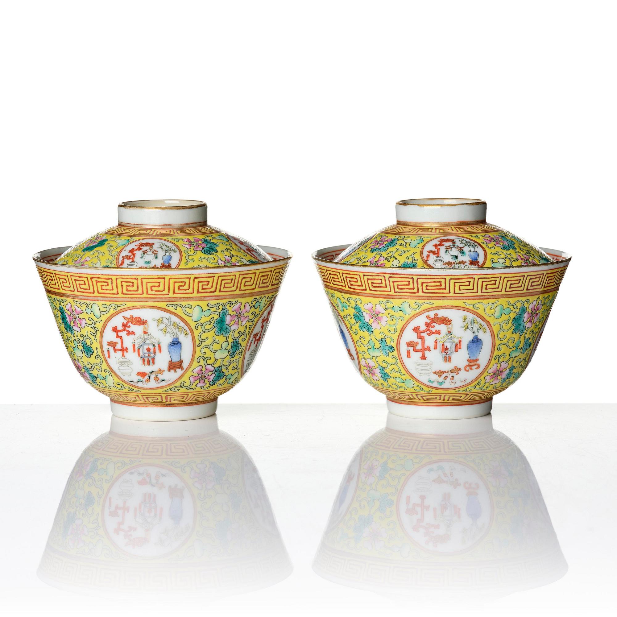 A pair of yellow ground 'medallion' bowls with covers, Qing dynasty with Daoguang mark.