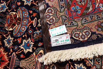 A Kashmar carpet, c. 310 x 203 cm.