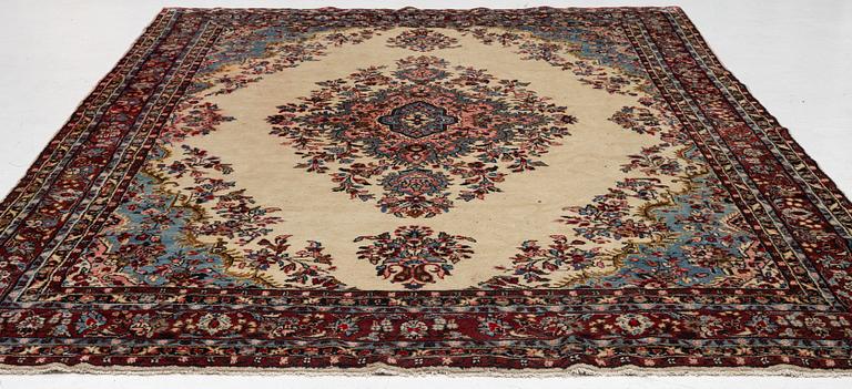 An oriental carpet, c. 370x260 cm.