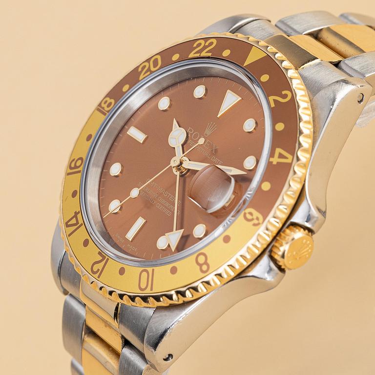Rolex, GMT-Master II, "Root Beer" & "Black Tritium Dial & Insert", ca 1995.
