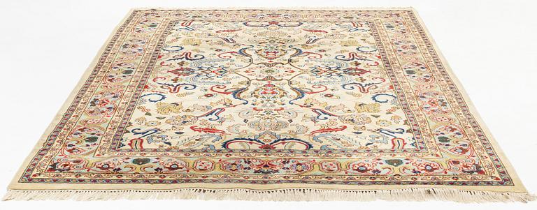 A carpet, signed, circa 286 x 212 cm.