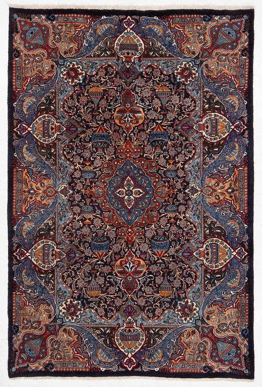 A Kashmar carpet, c. 295 x 198 cm.