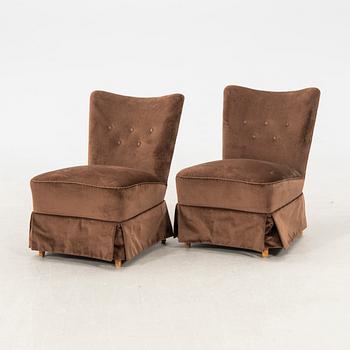 Armchairs, a pair from the 1940s.