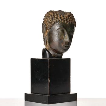 A bronze buddha head, Siam, Sawankhalok, 10th/11th Century.