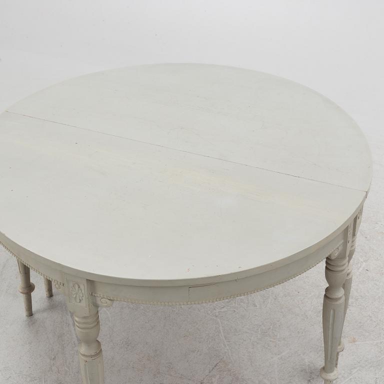 A late 19th Century painted dining table.