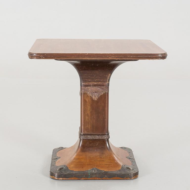 A mahogany veneered Art Nouveau table, early 20th century.