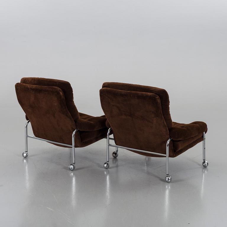 TWO 1970`S ARMCHAIRS.