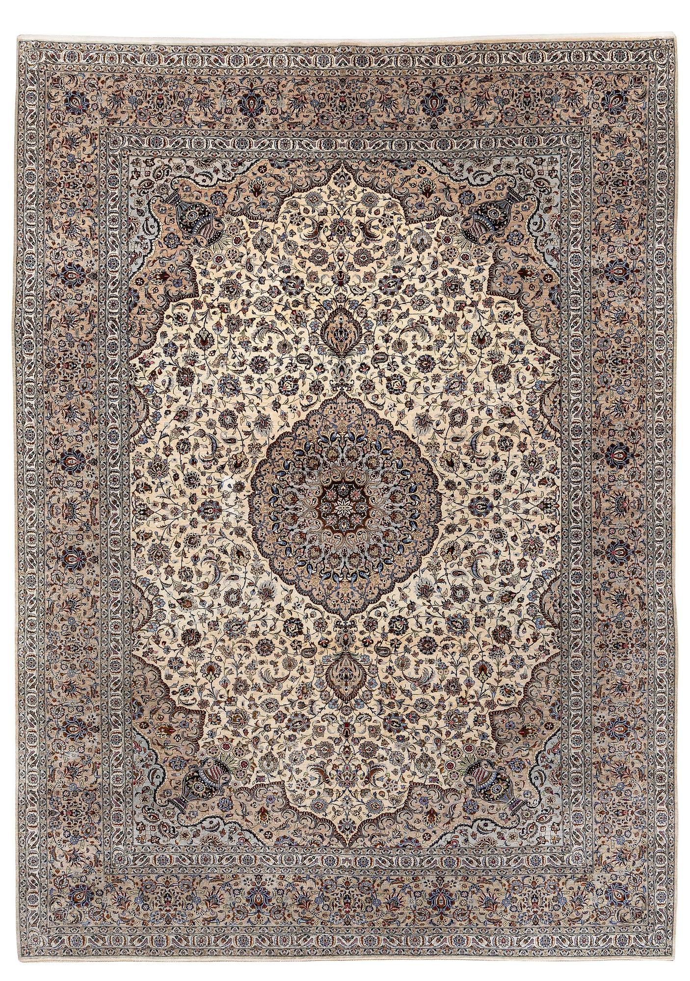 A semi-antique silk Keshan carpet, c. 350 x 248 cm.