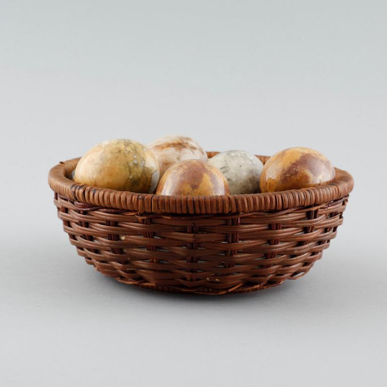 13 stone eggs from the late 20th century.