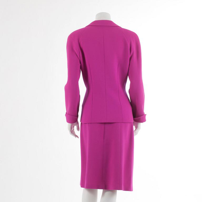 ESCADA, a hot pink wool two-piece suit consisting of a jacket and skirt. Size 42.