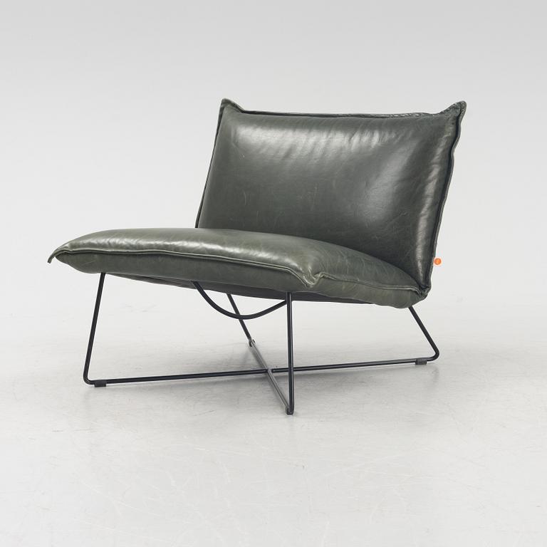 A contemporary lounge chair by Jess Design.