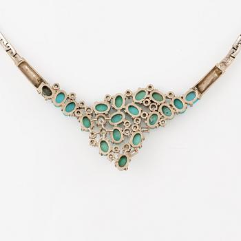 Necklace, 18K white gold with turquoises and baguette-, octagonal- and brilliant-cut diamonds.