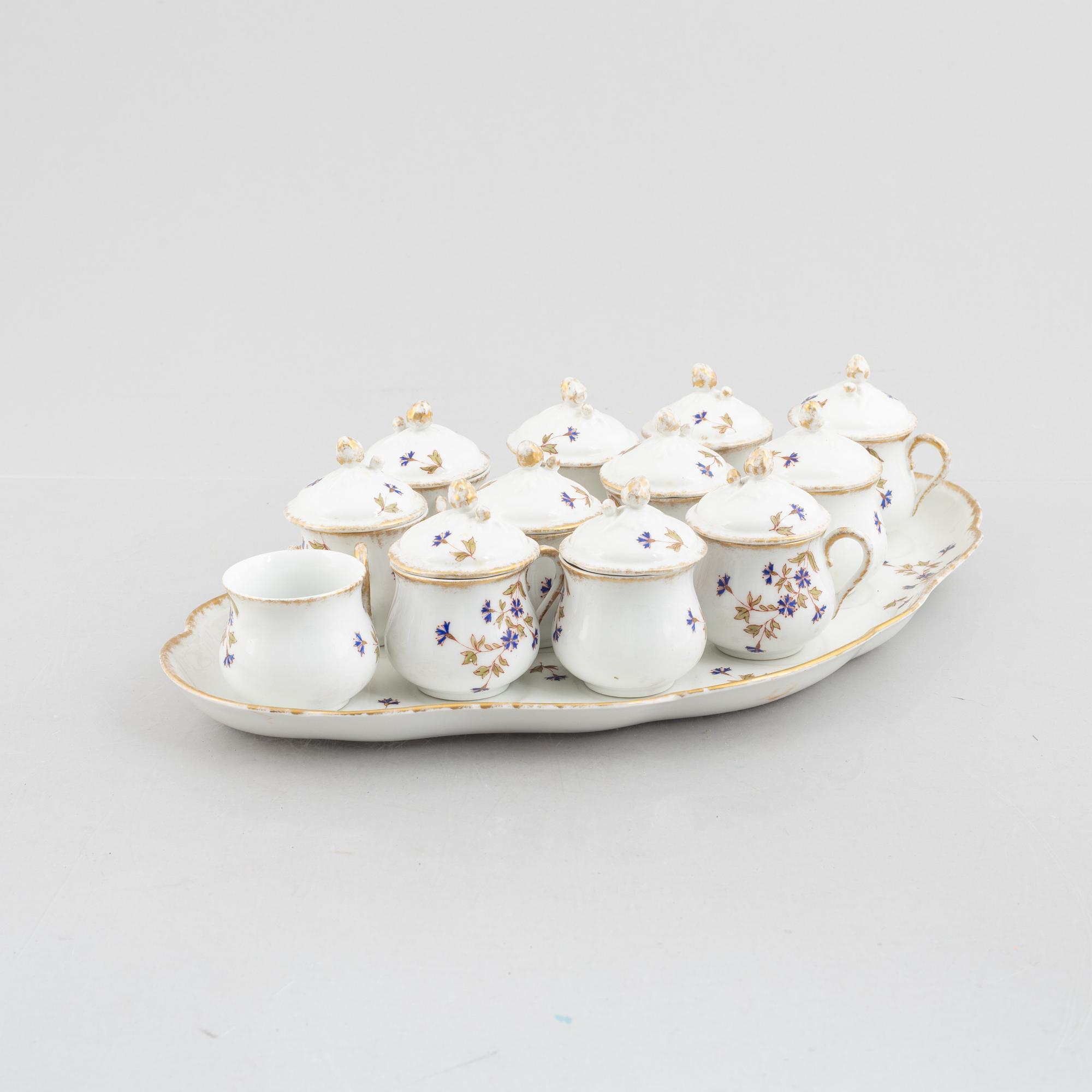 Tray with twelve creamers, porcelain, Limoges WG & Co, France.