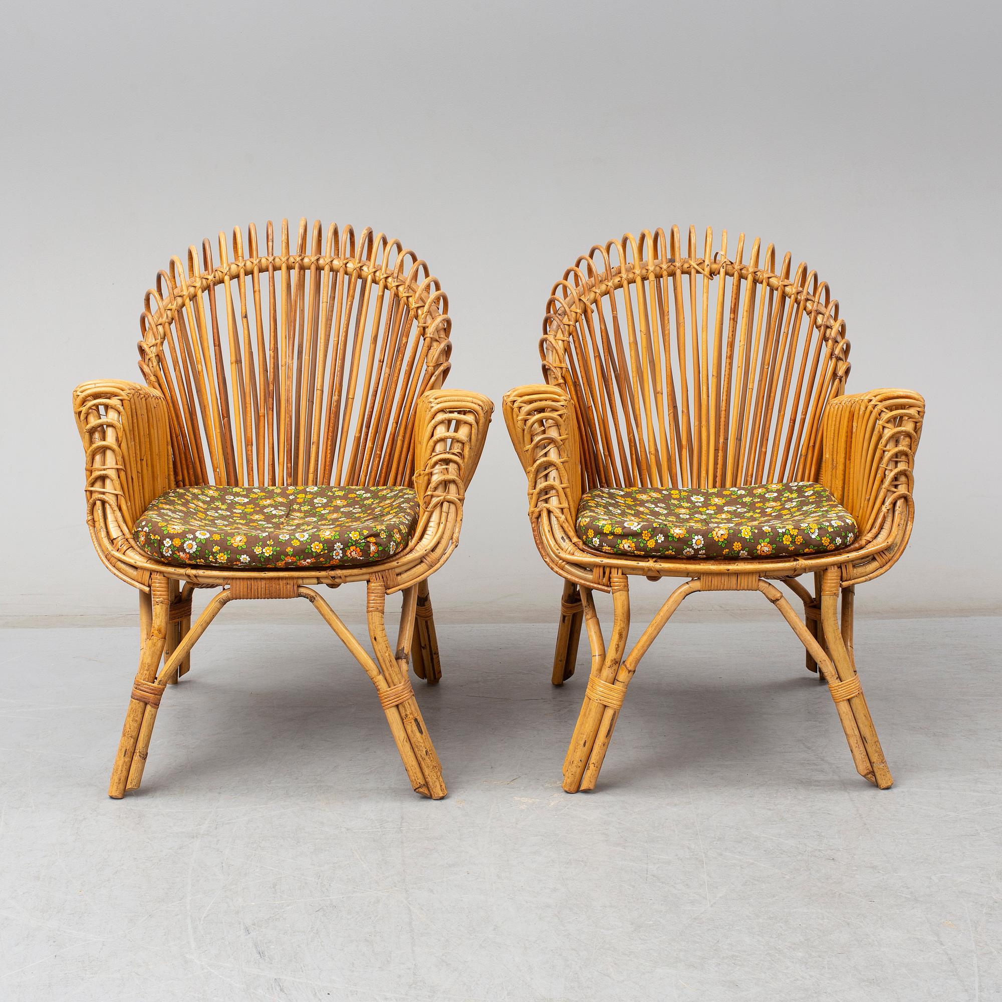 A pair of rattan armchairs, Emilio Paoli, via Vigna Nuova, 8, Firenze, Italy, second half of the 20th century. Signed.