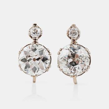 1153. A pair of old-cut diamond, circa 5.00 cts in total, circa I-J/I1, earrings.