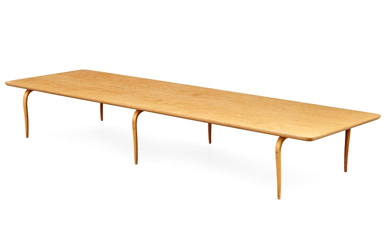 A Bruno Mathsson birch table for magazines, Värnamo, Sweden 1962.