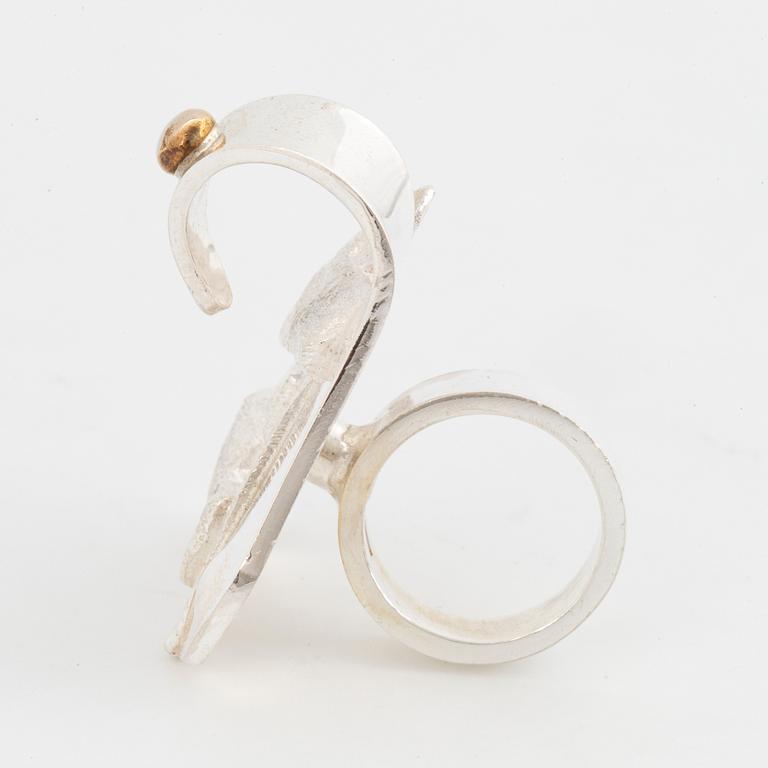 A Rolf Karlsson sterling silver ring.