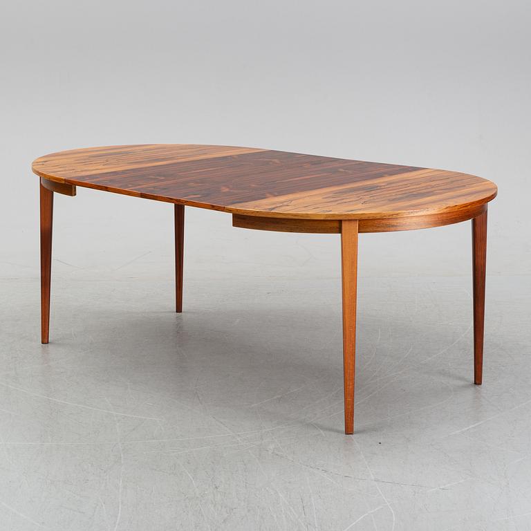 A rosewood dining table, 1970's.