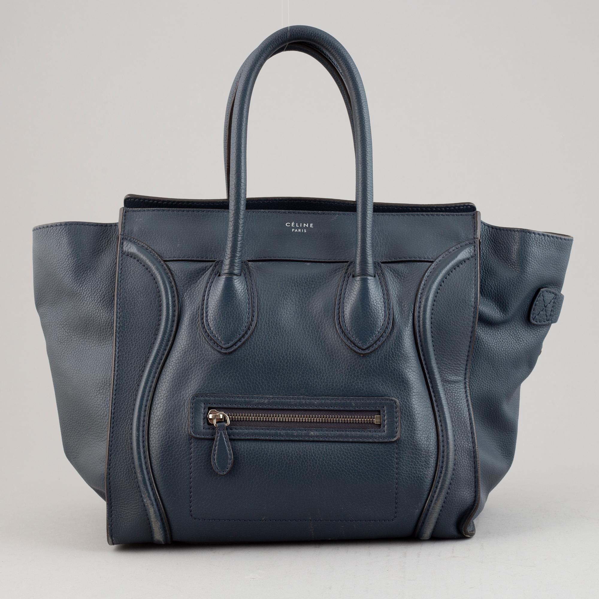 Céline, a teal leather 'Luggage' handbag.