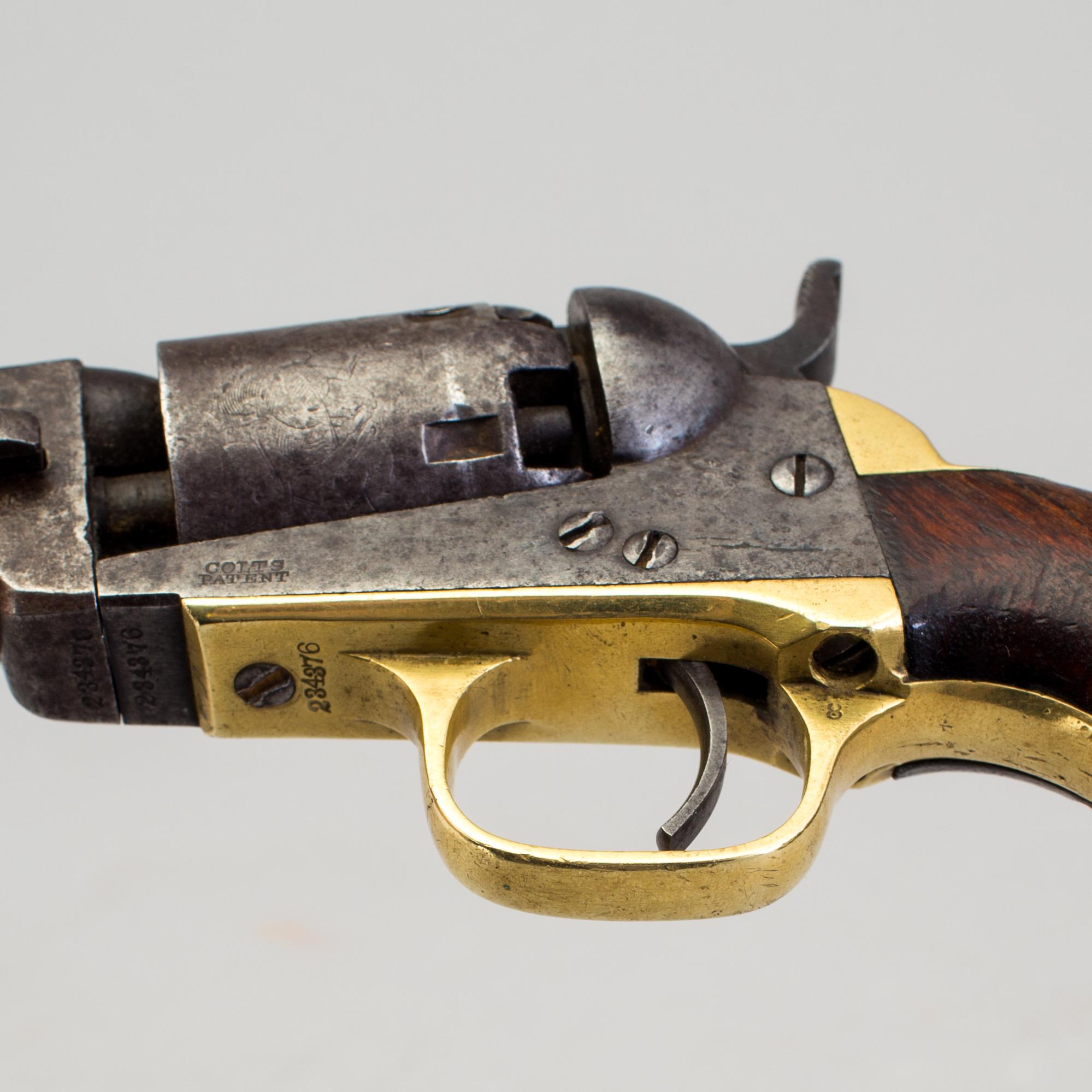 A Colt percussion revolver mid 19th century.