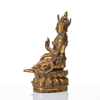 A large gilt copper alloy figure of Tara, Ming dynasty (1368-1644).