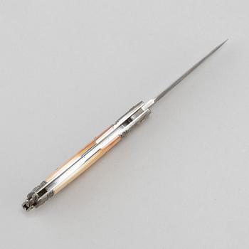 Kaj Embretsen, a damascus steel folding knife, signed.