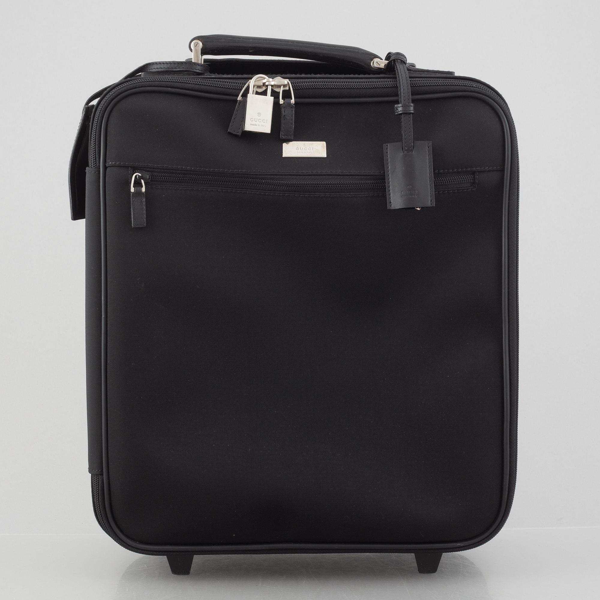 Gucci, suitcase/cabin bag.