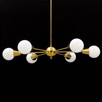 A brass and glass ceiling light, 21st Century.