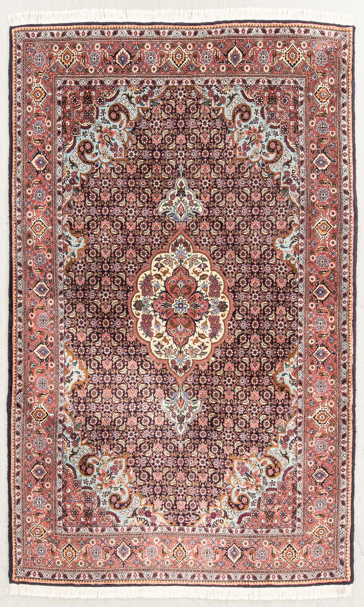 An old Bidjar carpet approx 210x138 cm.