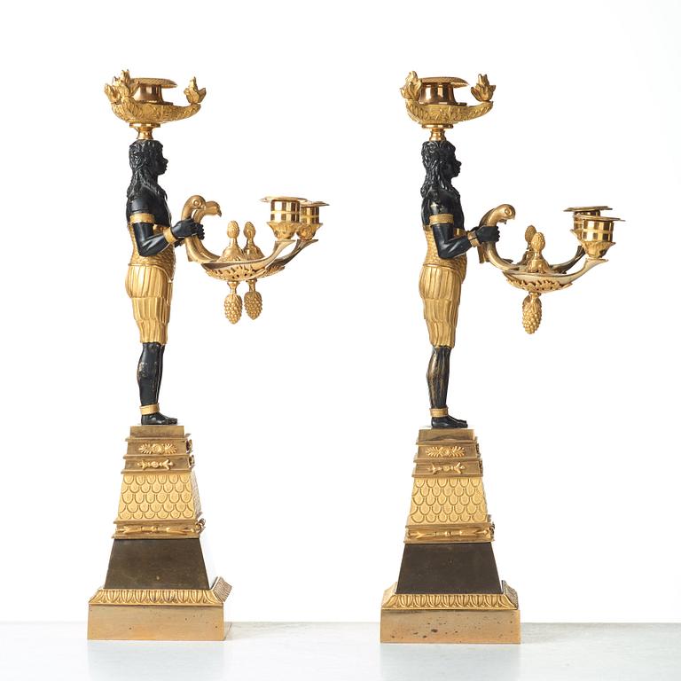 A pair of Empire three-light candelabra, circa 1810.